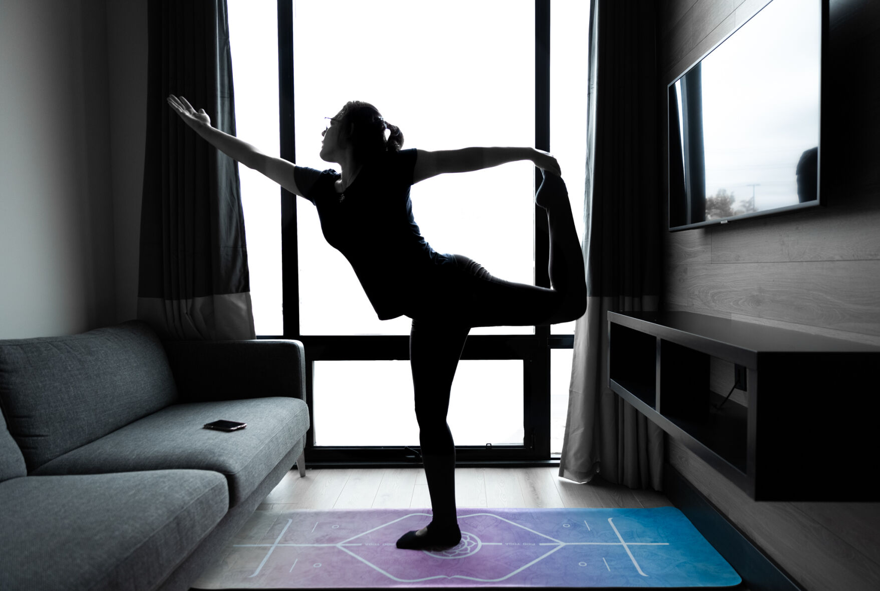 Student doing Yoga at home